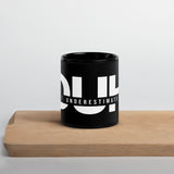 Don't Underestimate Him - Black Glossy Mug