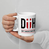 Don't Underestimate Him - White glossy mug