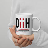 Don't Underestimate Him - White glossy mug